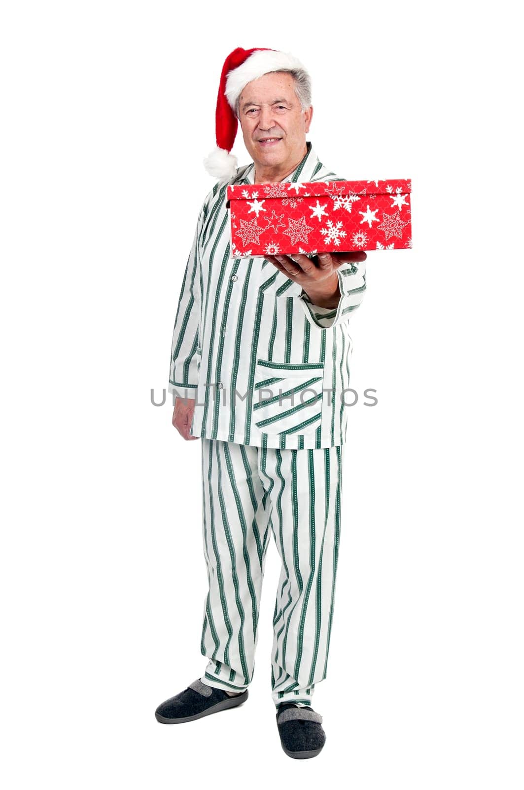 Happy senior with Christmas hat and gift box