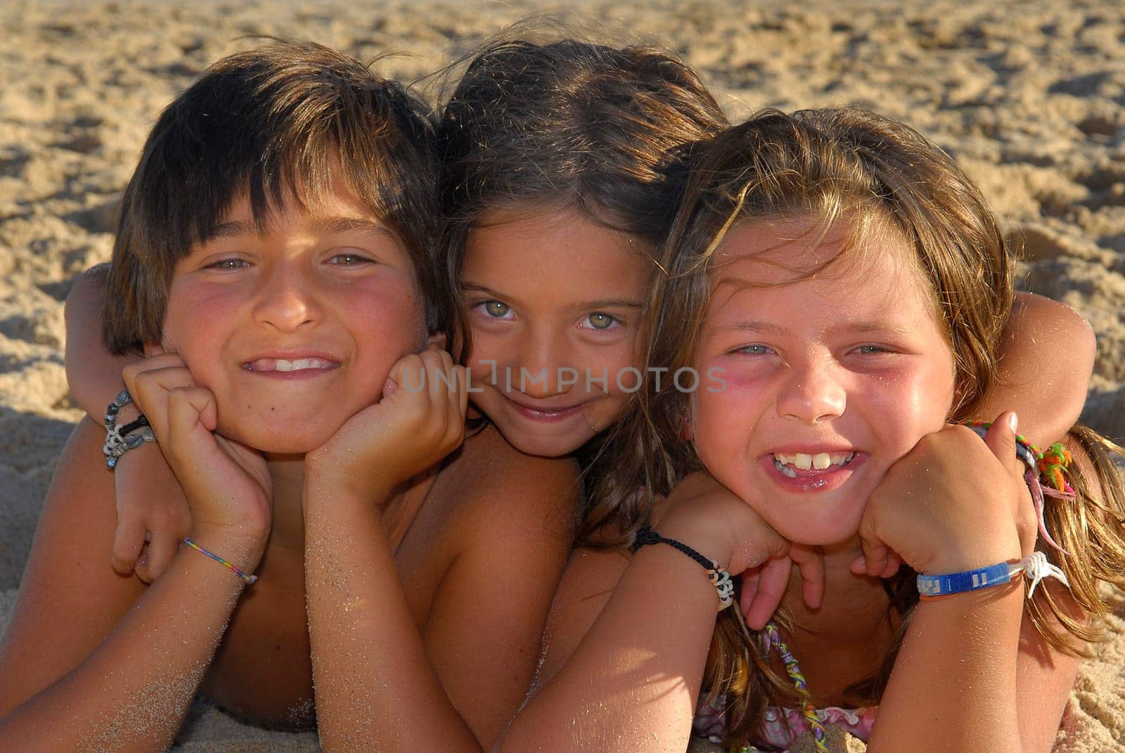 Three brothers in the beach