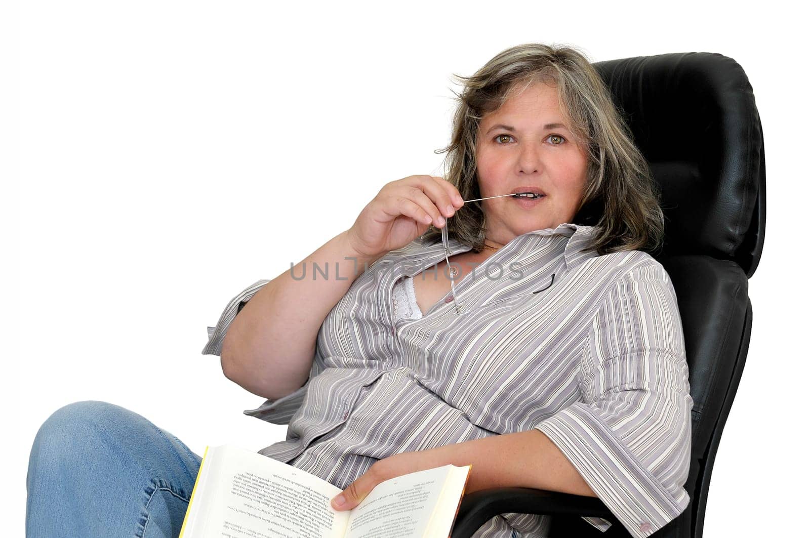 Beautiful mature woman with book isolated in white