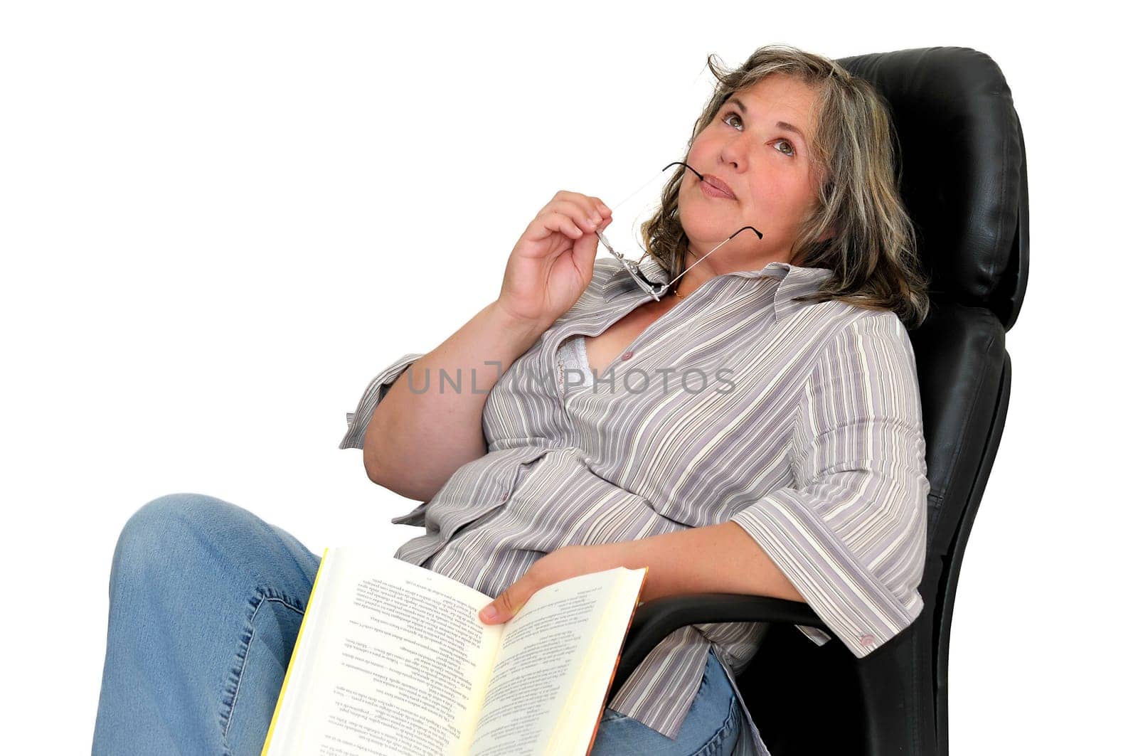 Beautiful mature woman with book isolated in white