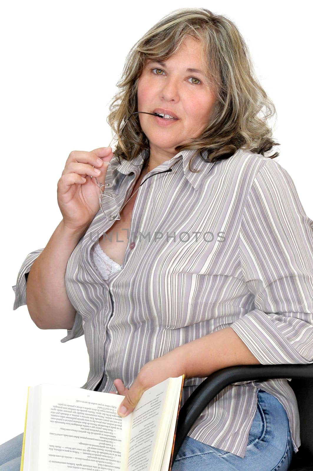 Beautiful mature woman with book isolated in white