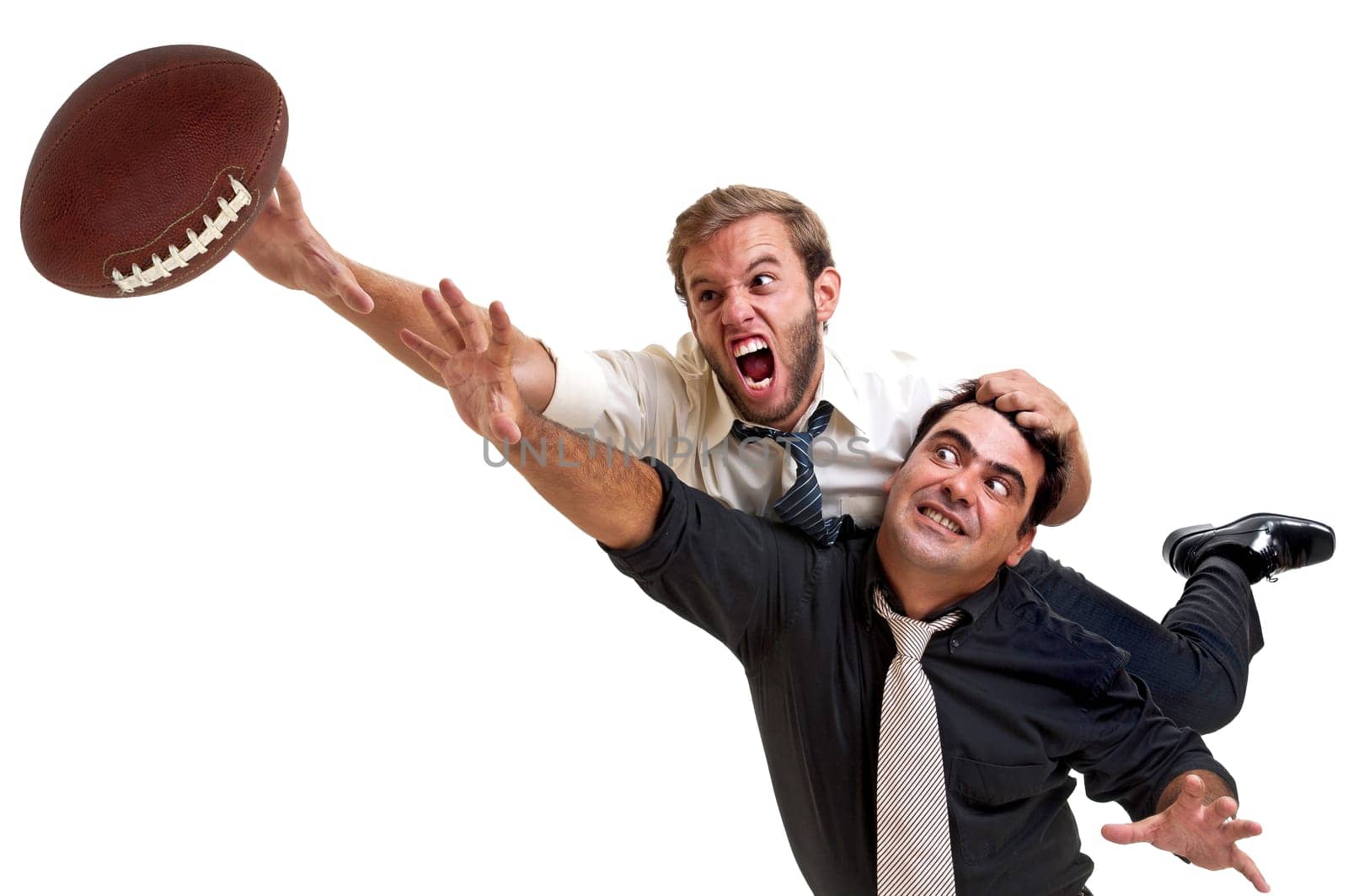 Businessmen playing rugby isolated in white