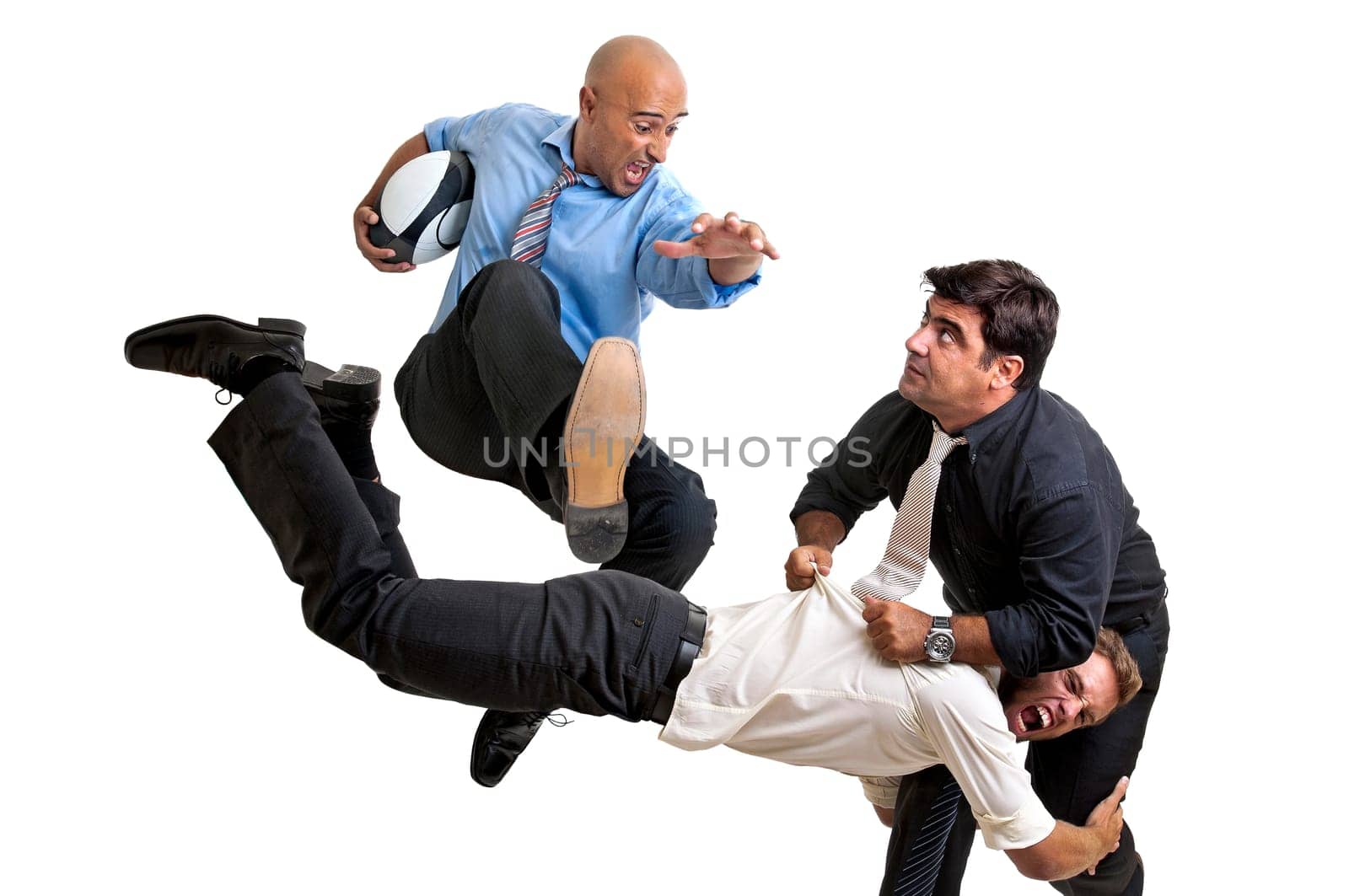 Businessmen playing rugby isolated in white