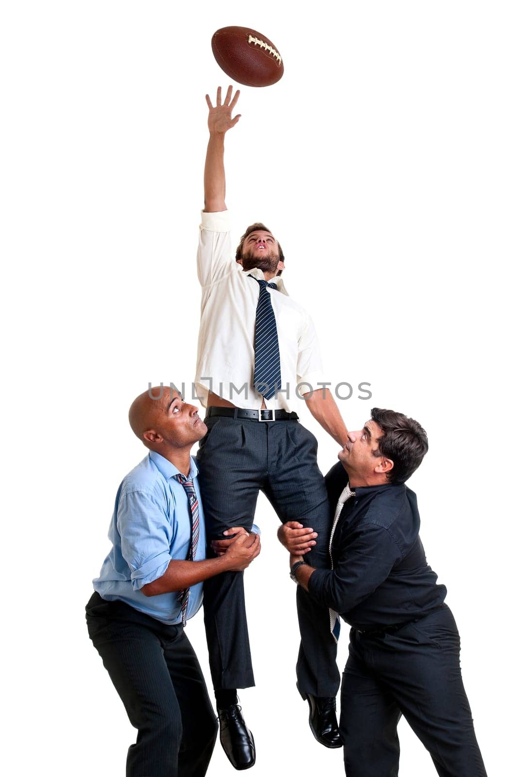 Businessmen playing rugby isolated in white