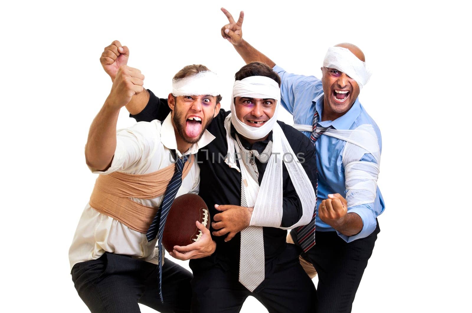 Group of injured businessmen after a rugby game