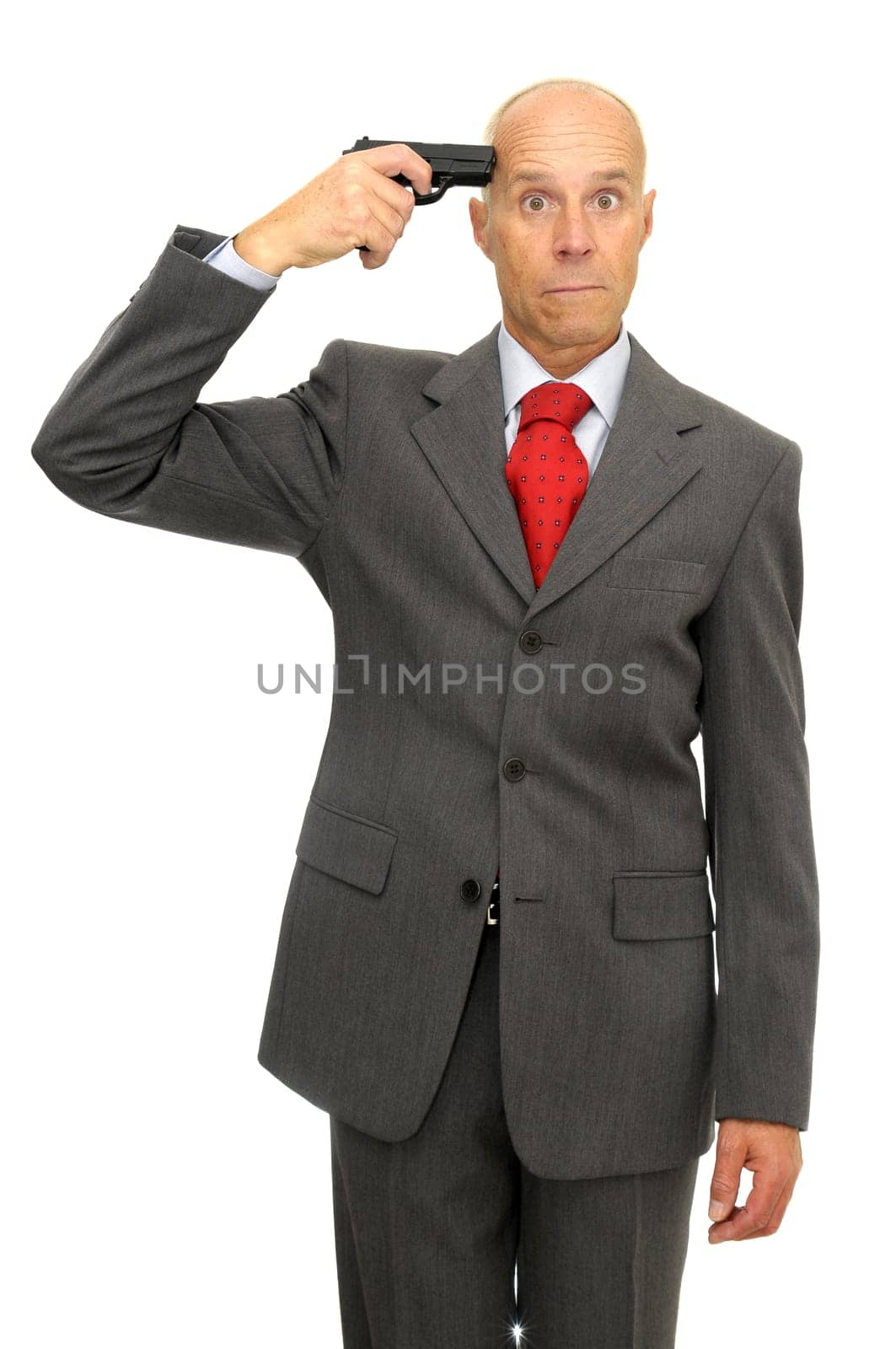 Mature man with a gun isolated in white