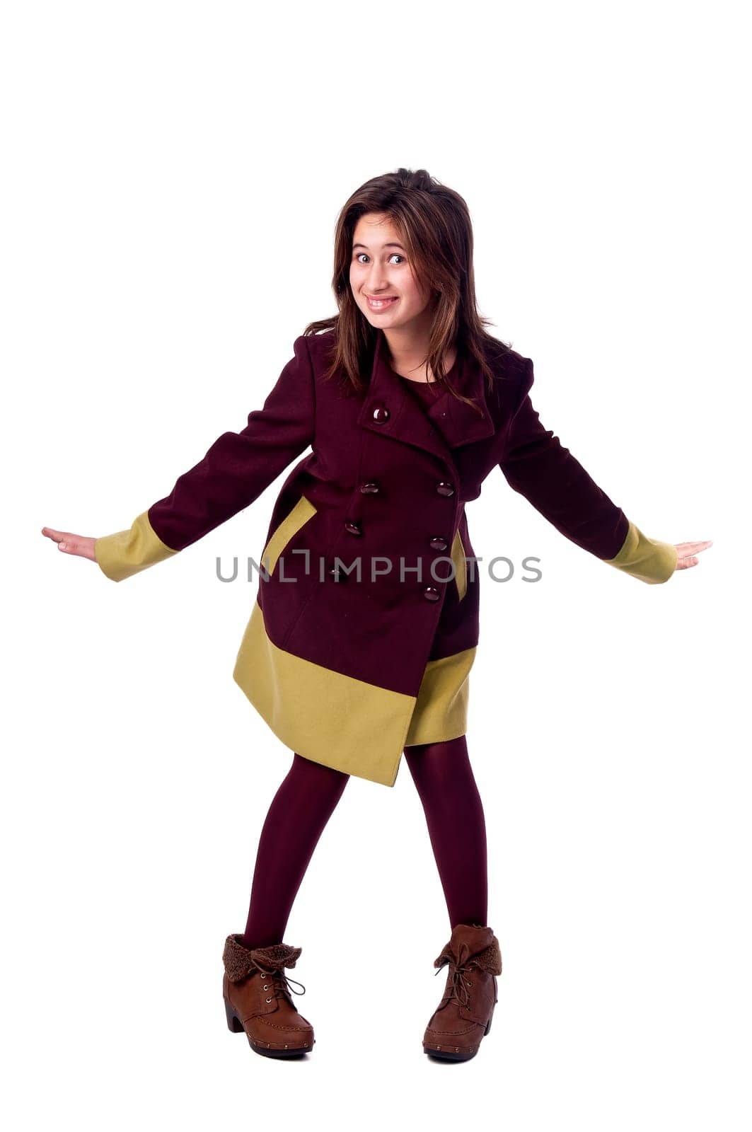 Beautiful young girl posing isolated in white