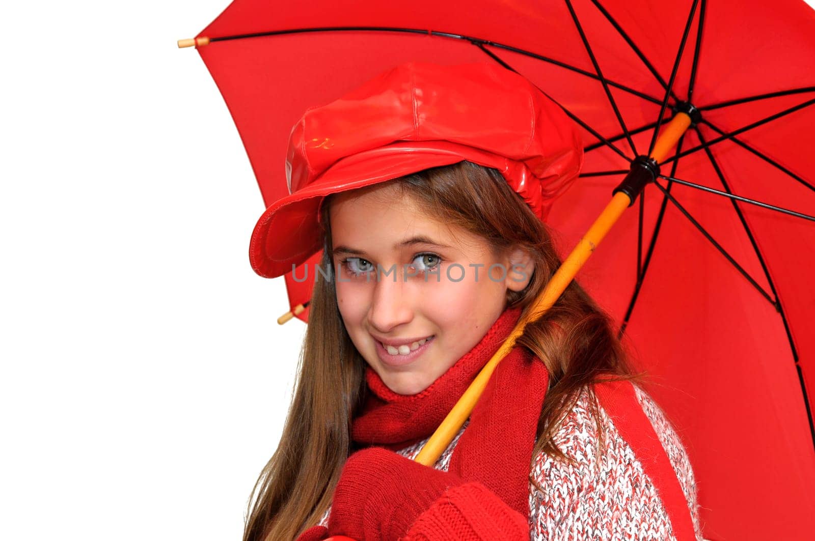 Beautiful young girl with red umbrella isolated in white