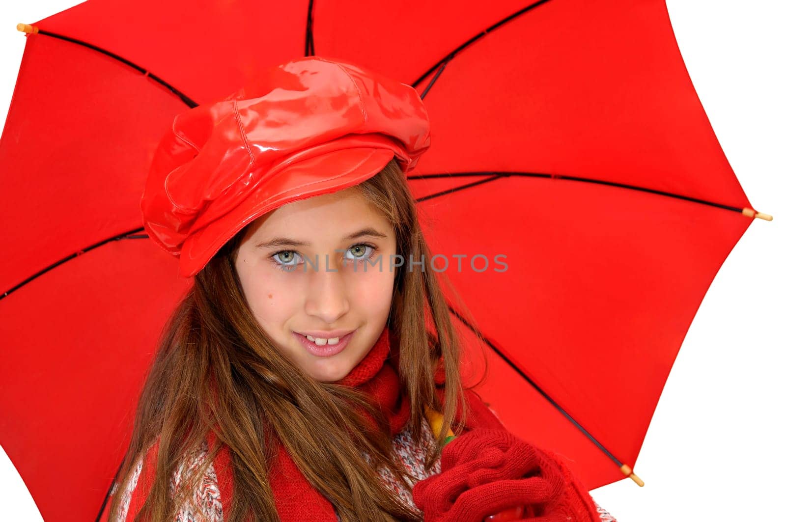 Beautiful young girl with red umbrella isolated in white