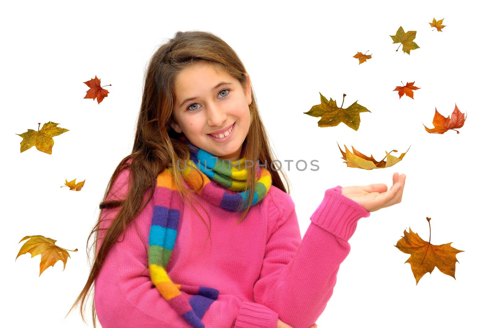 Beautiful young girl in Autumn with falling leaves isolated in white