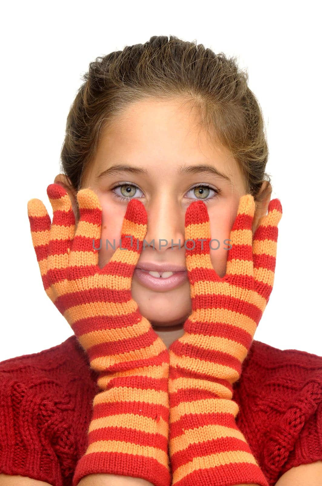 Beautiful young girl posing with gloves against a white background
