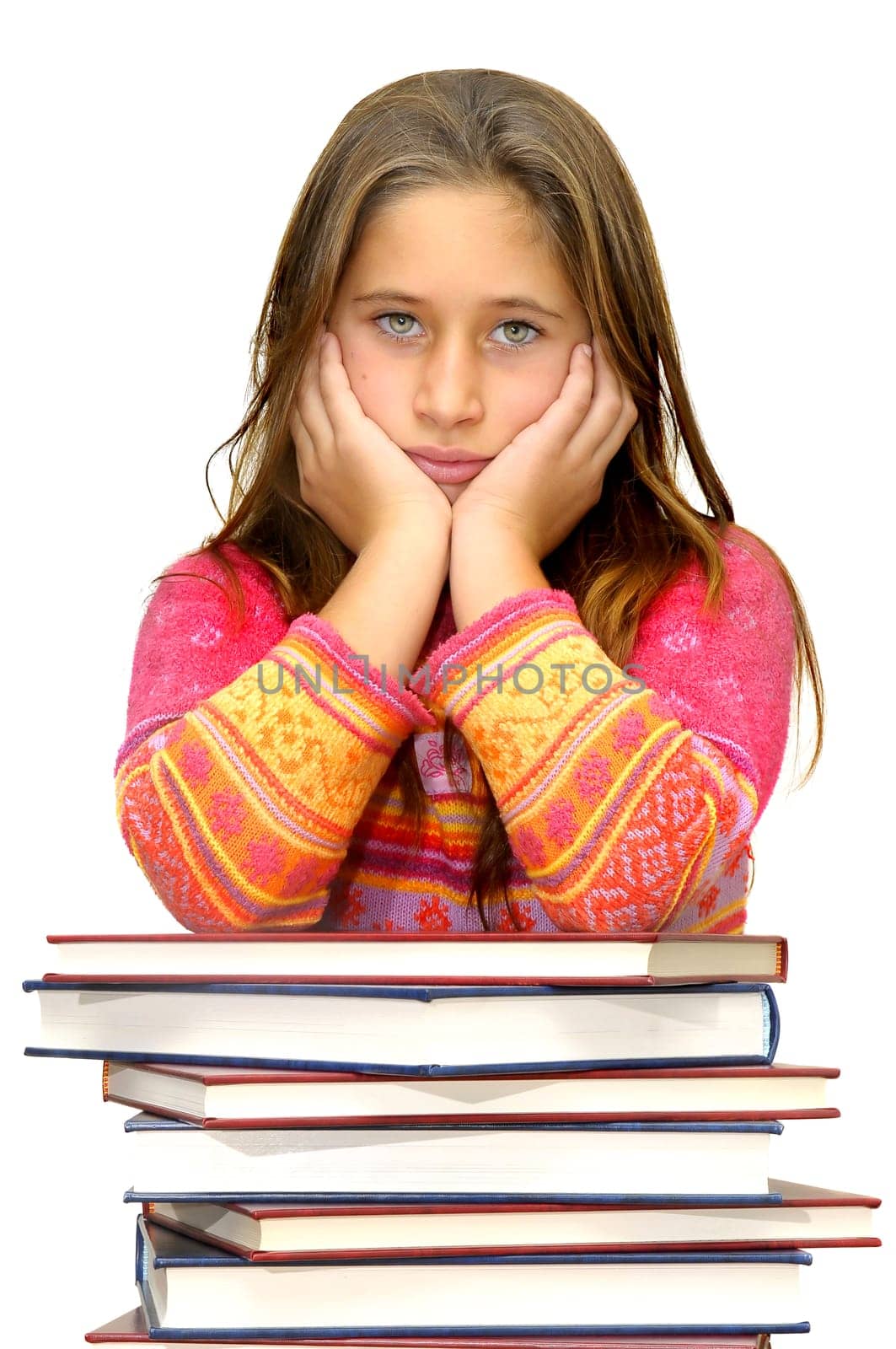Beautiful young girl posing with books against a white background