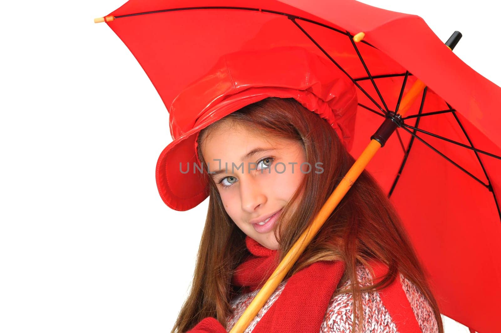 Beautiful young girl with red umbrella isolated in white