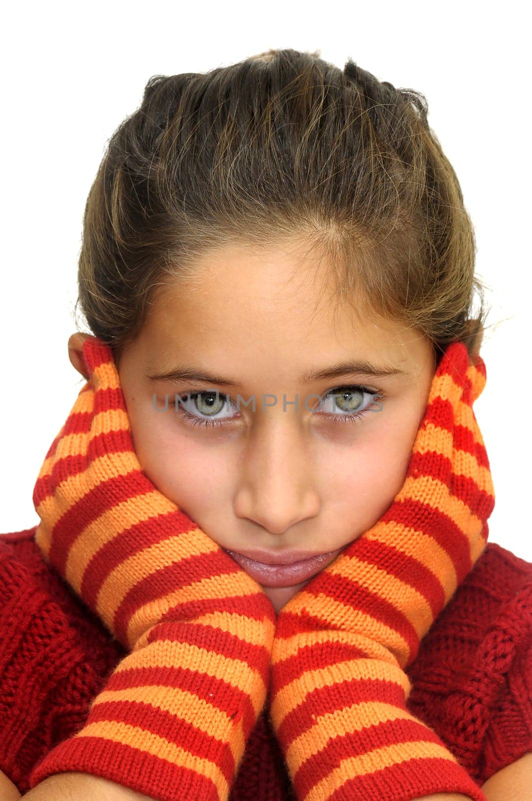 Beautiful young girl posing with gloves against a white background