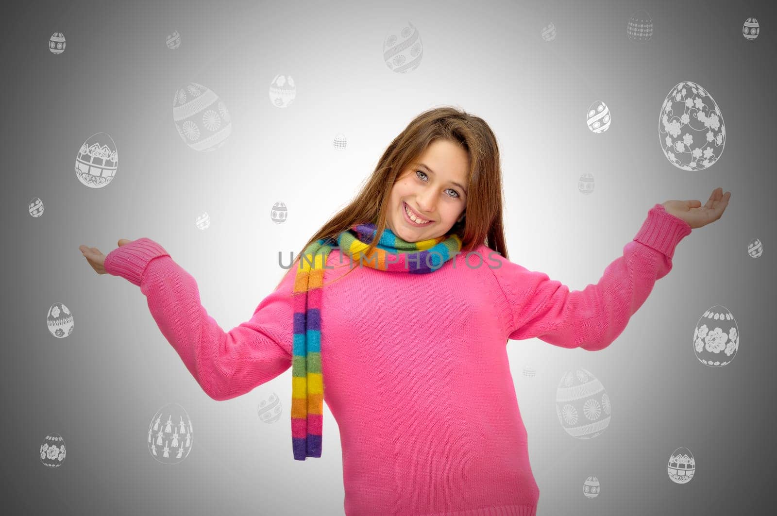 Beautiful young girl in Easter with falling eggs