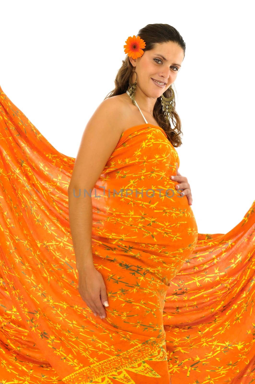 Pregnant woman with orange rag and flowers isolated in white