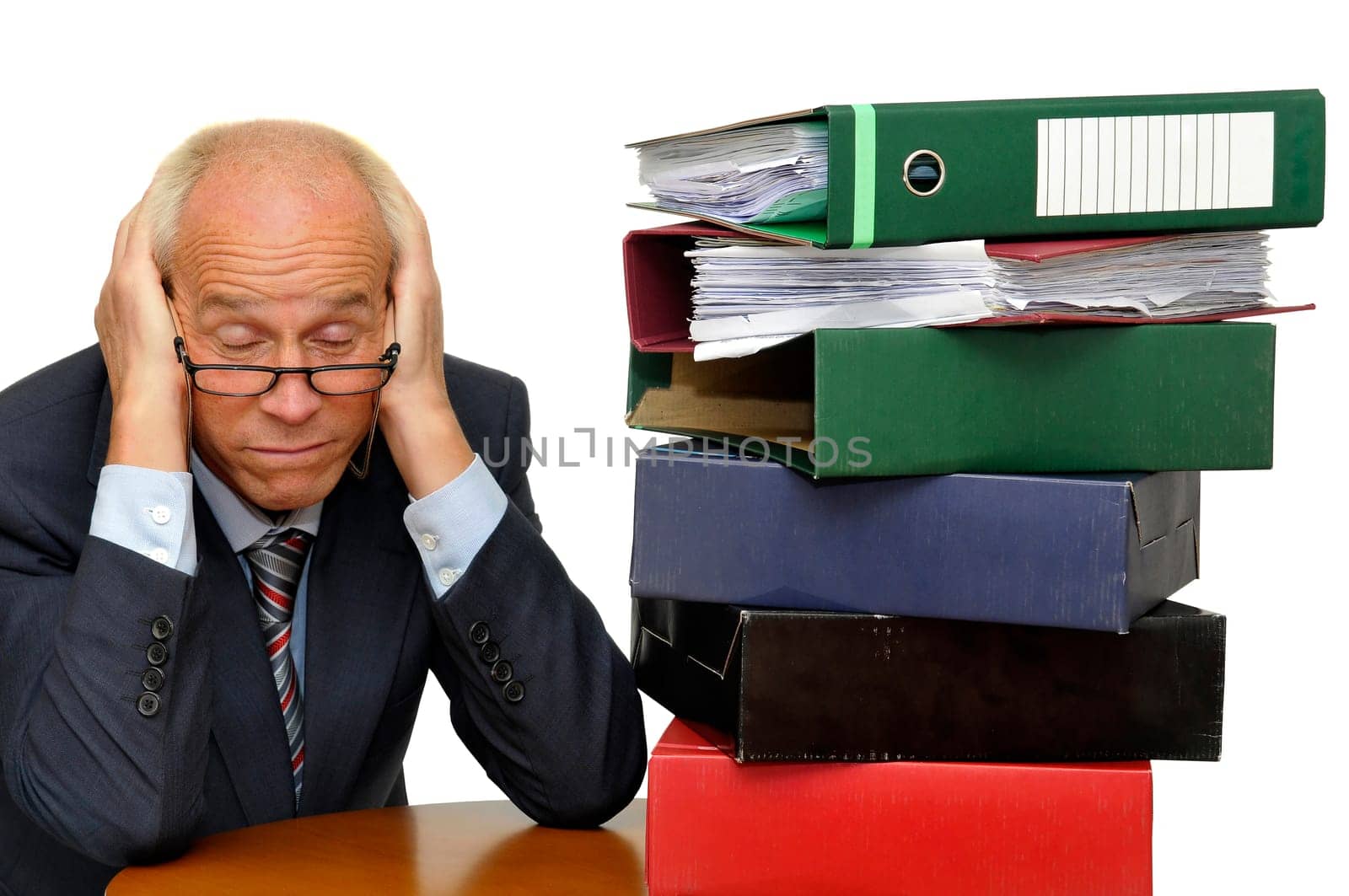 Mature businessman with stack of files isolated in white