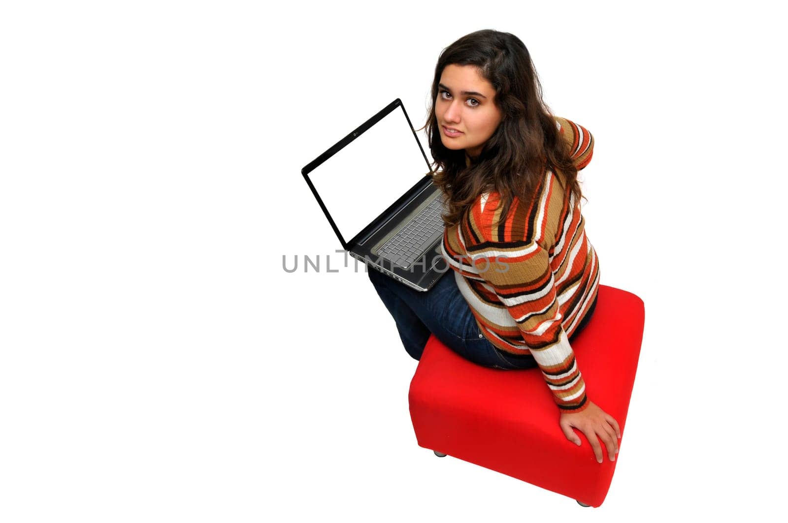 Beautiful teen with laptop isolated in white