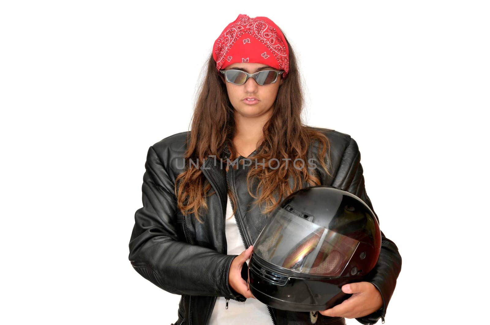 Young girl biker with helmet isolated in white