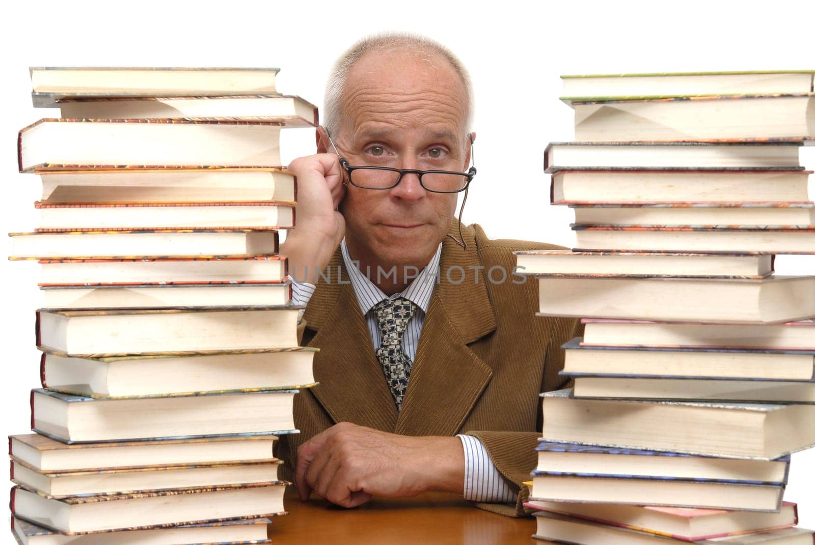 Mature man with books isolated in white