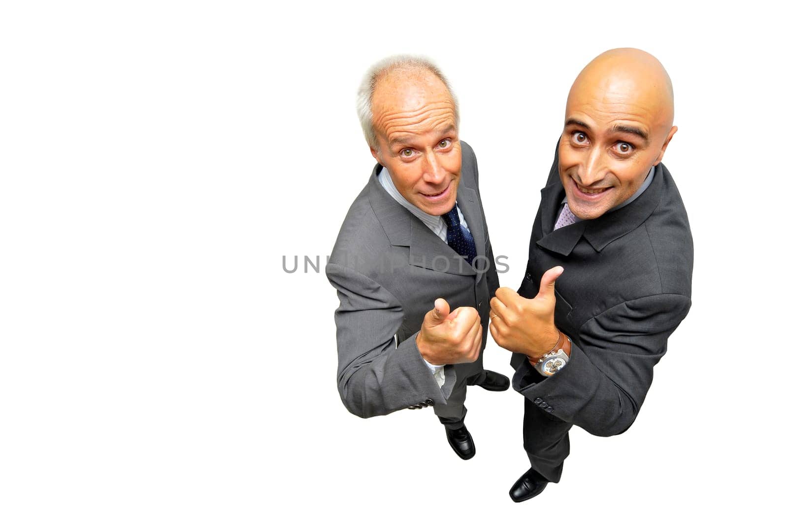 Two businessmen posing isolated in white