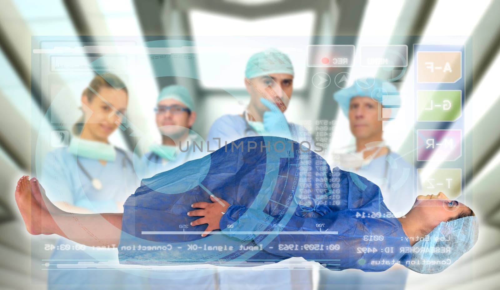 Doctors team with pregnant pacient in medical facilities with modern screen