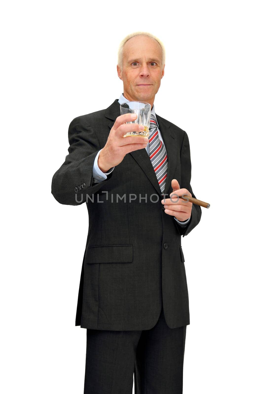 Mature businessman with whisky and cigar isolated in white