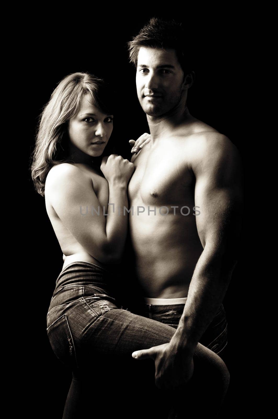 Beautiful fashionable young couple dressed in jeans