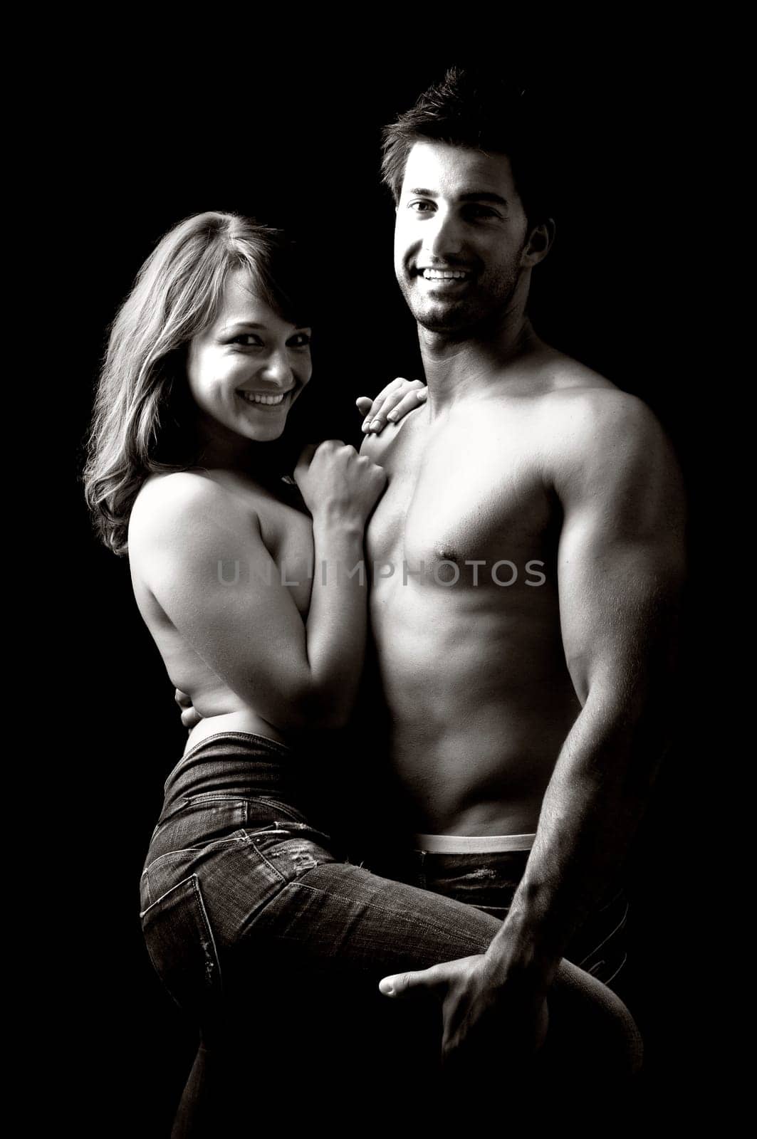 Beautiful fashionable young couple dressed in jeans