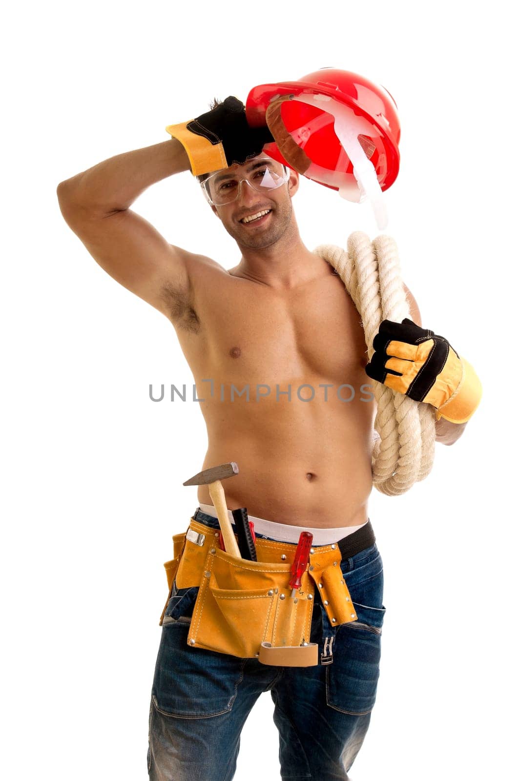 Strong build construction worker isolated in white