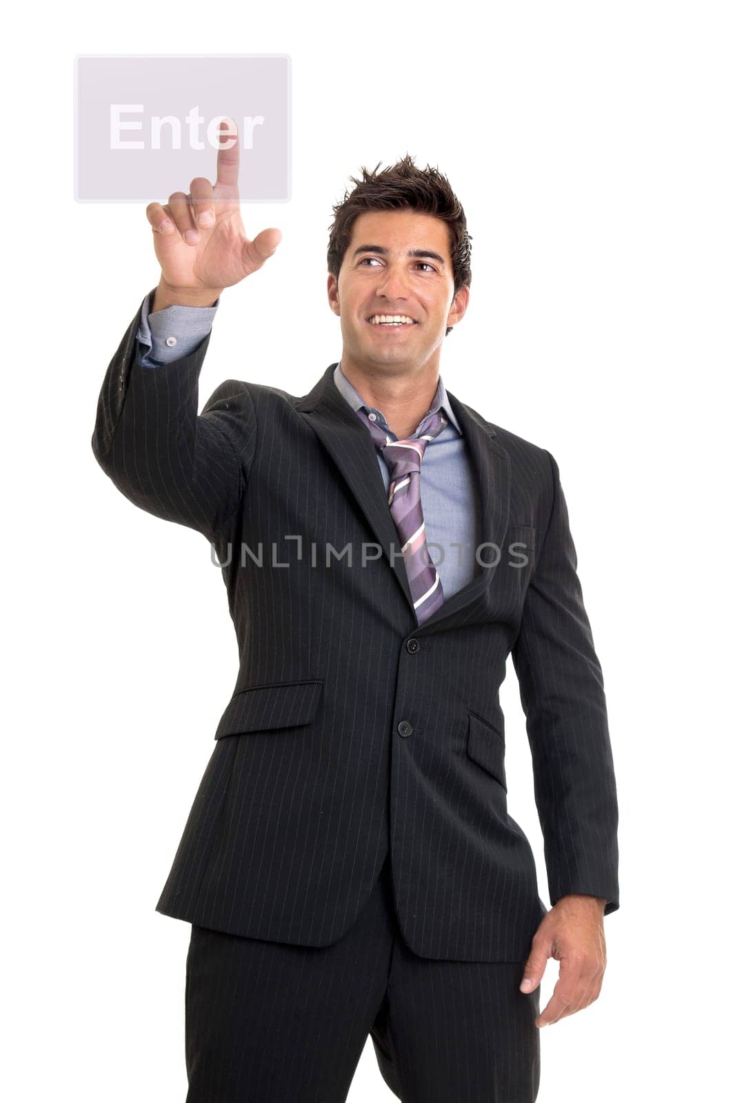 Young businessman pushing the enter button isolated in white