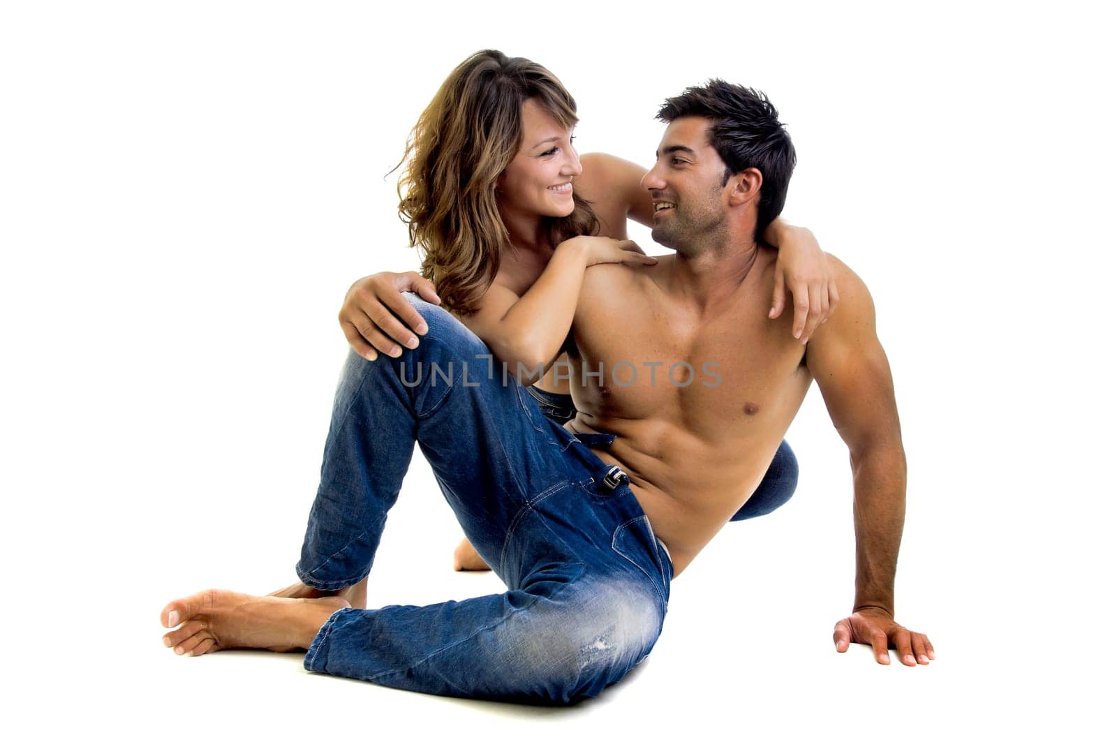 Beautiful fashionable young couple dressed in jeans