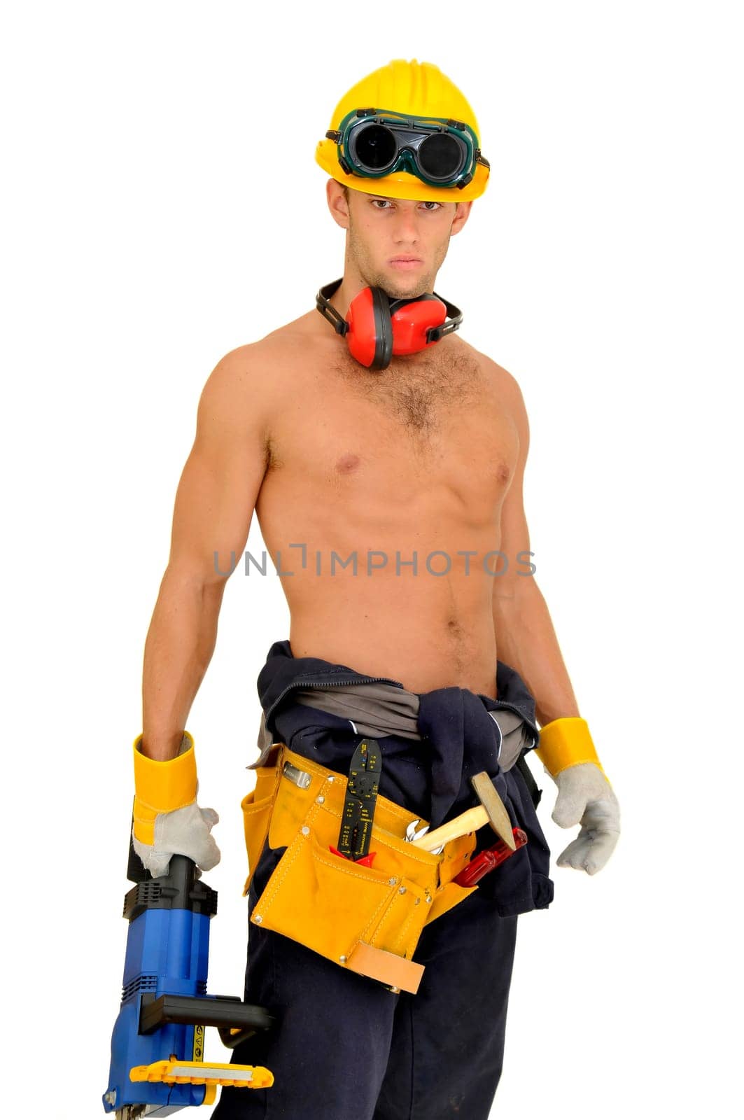Muscular construction worker with chainsaw posing isolated in white