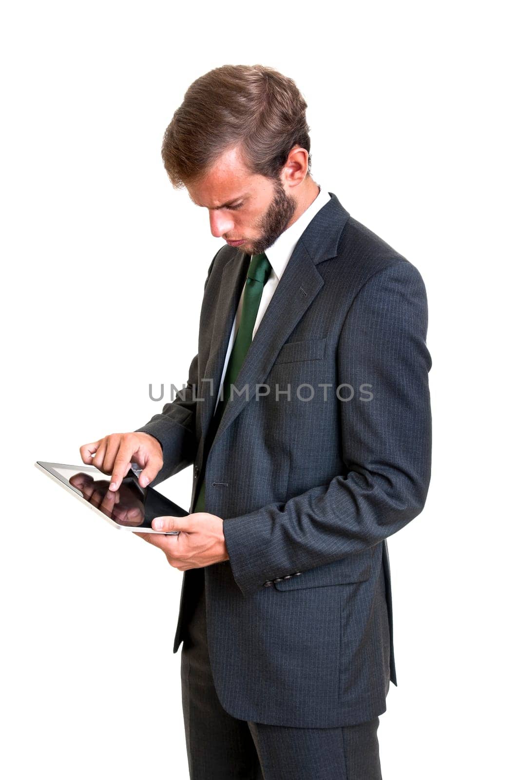 Young businessman with tablet isolated in white