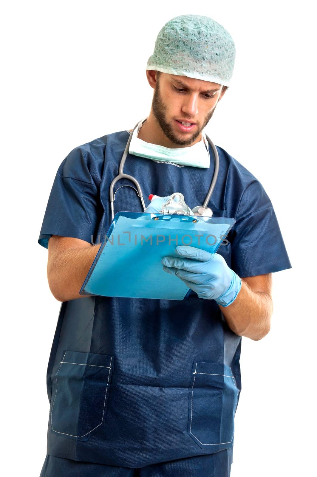 Young doctor in uniform writing in a pad