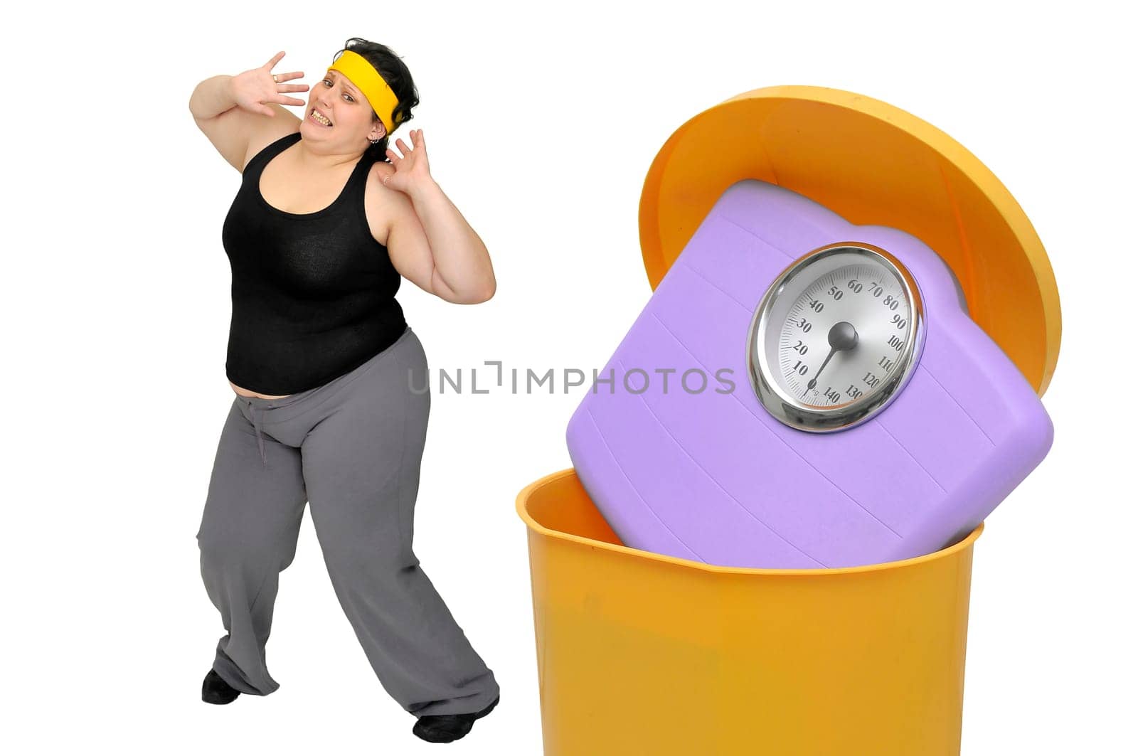 Large woman loking at a weight scale in the garbage
