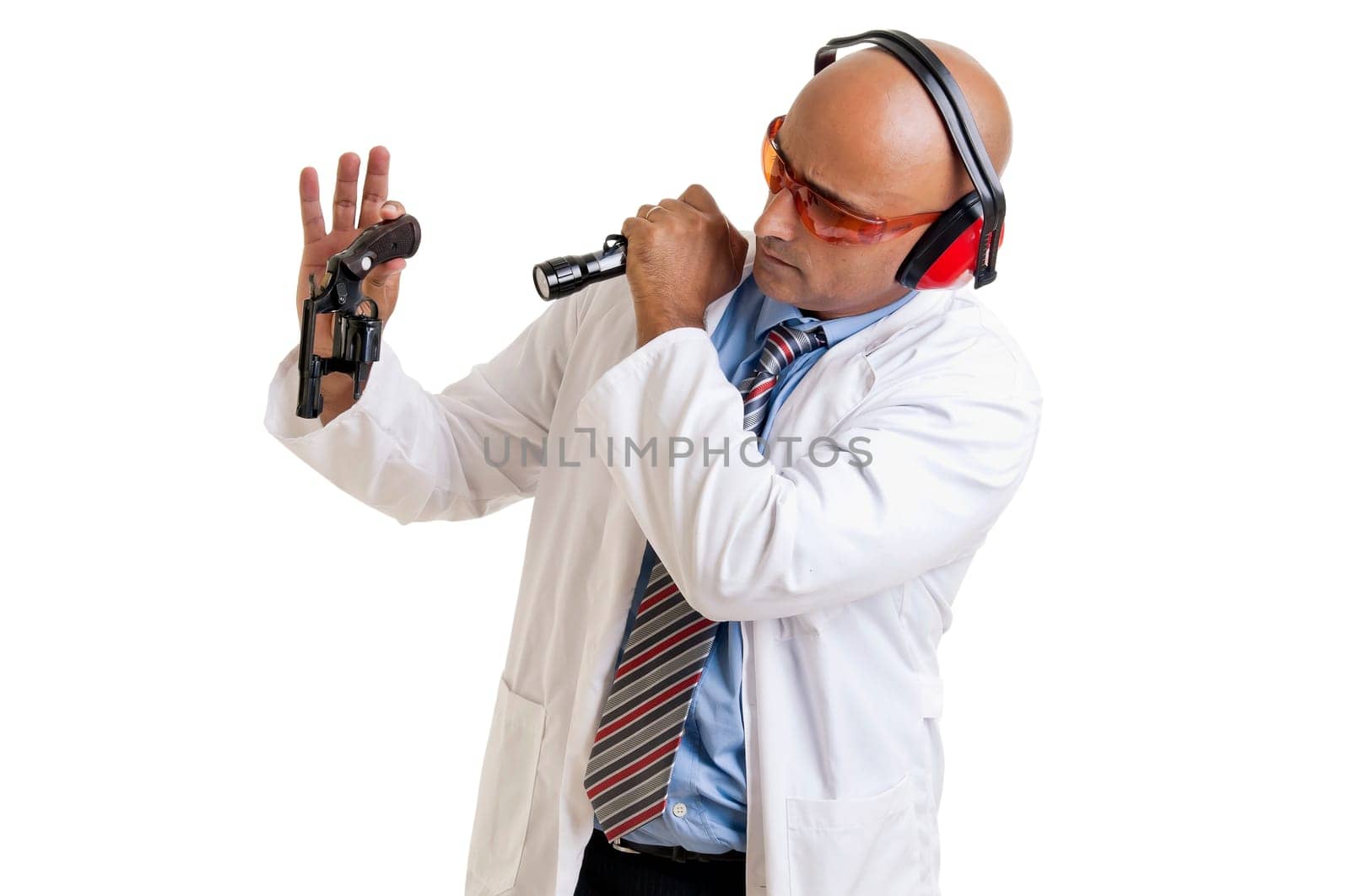 Investigator processing a hand gun