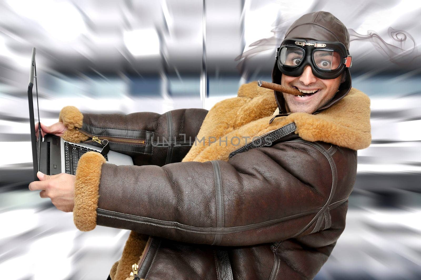 Figther pilot with laptop at full speed