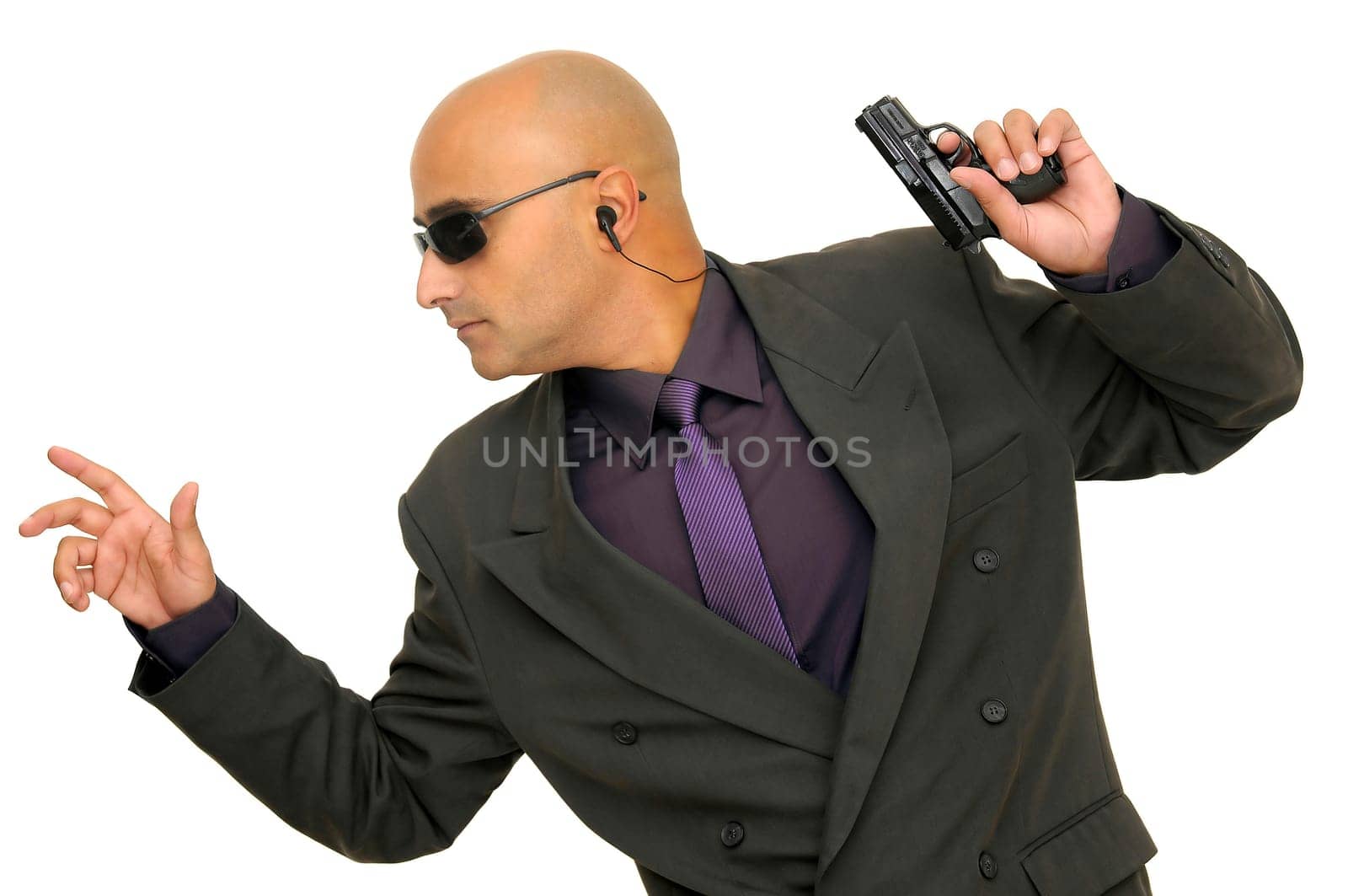 Man with gun isolated against a white background