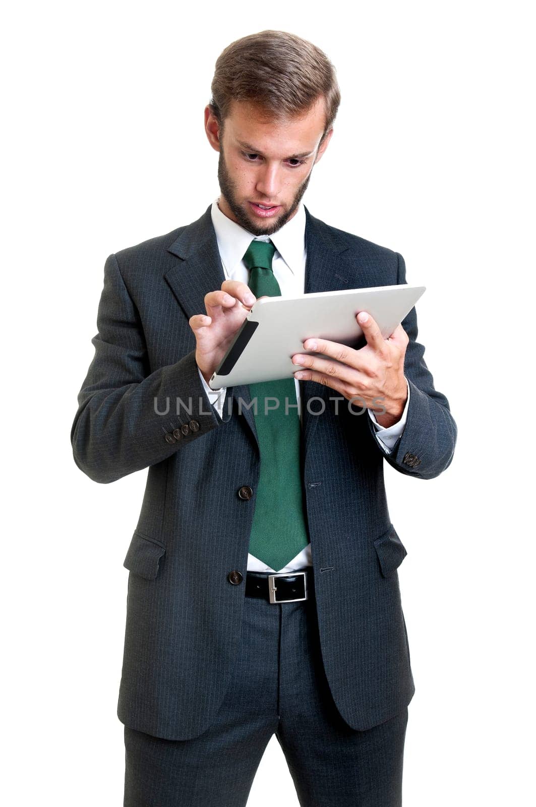 Young businessman with tablet isolated in white