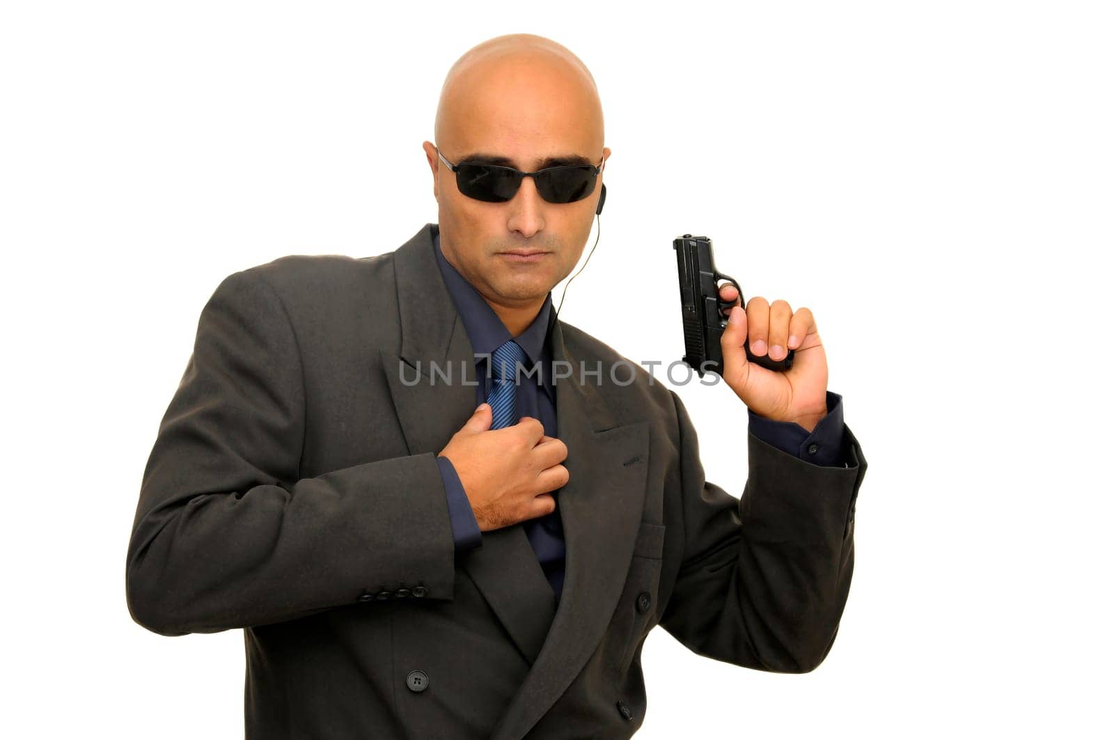 Man with gun isolated against a white background