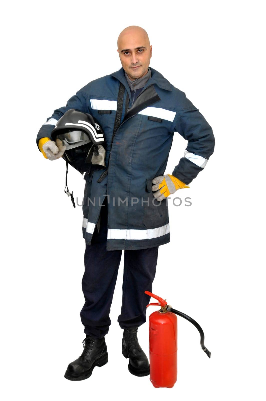 Fireman in uniform isolated in white