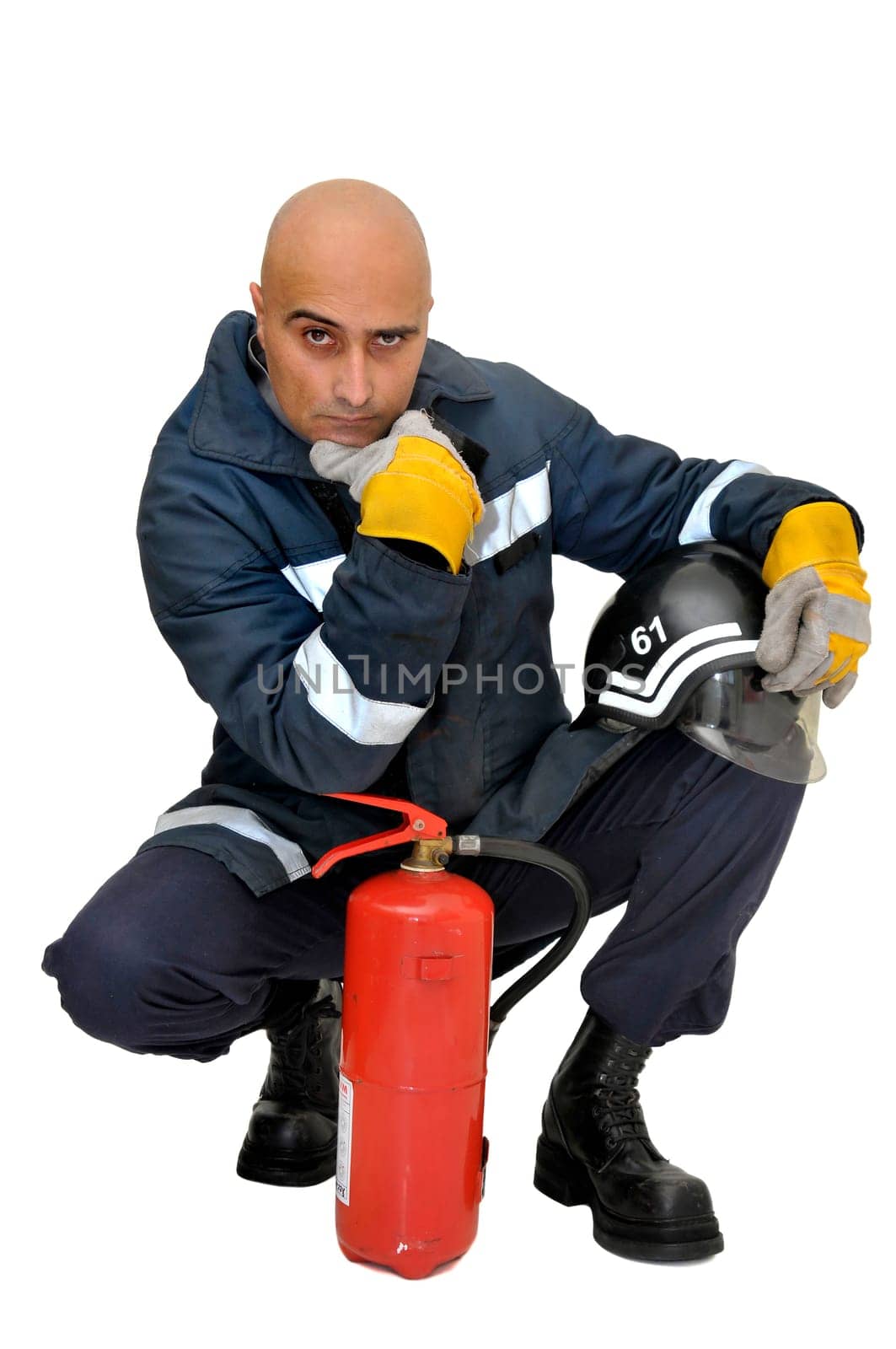 Fireman with extinguisher isolated in white