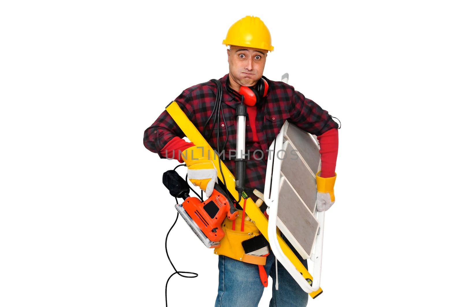 Construction worker stressed with lots of tools isolated in white