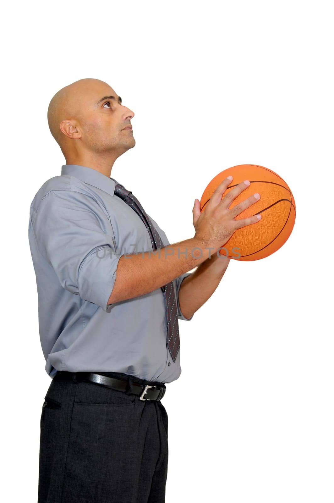 Businessman with basketball isolated in white