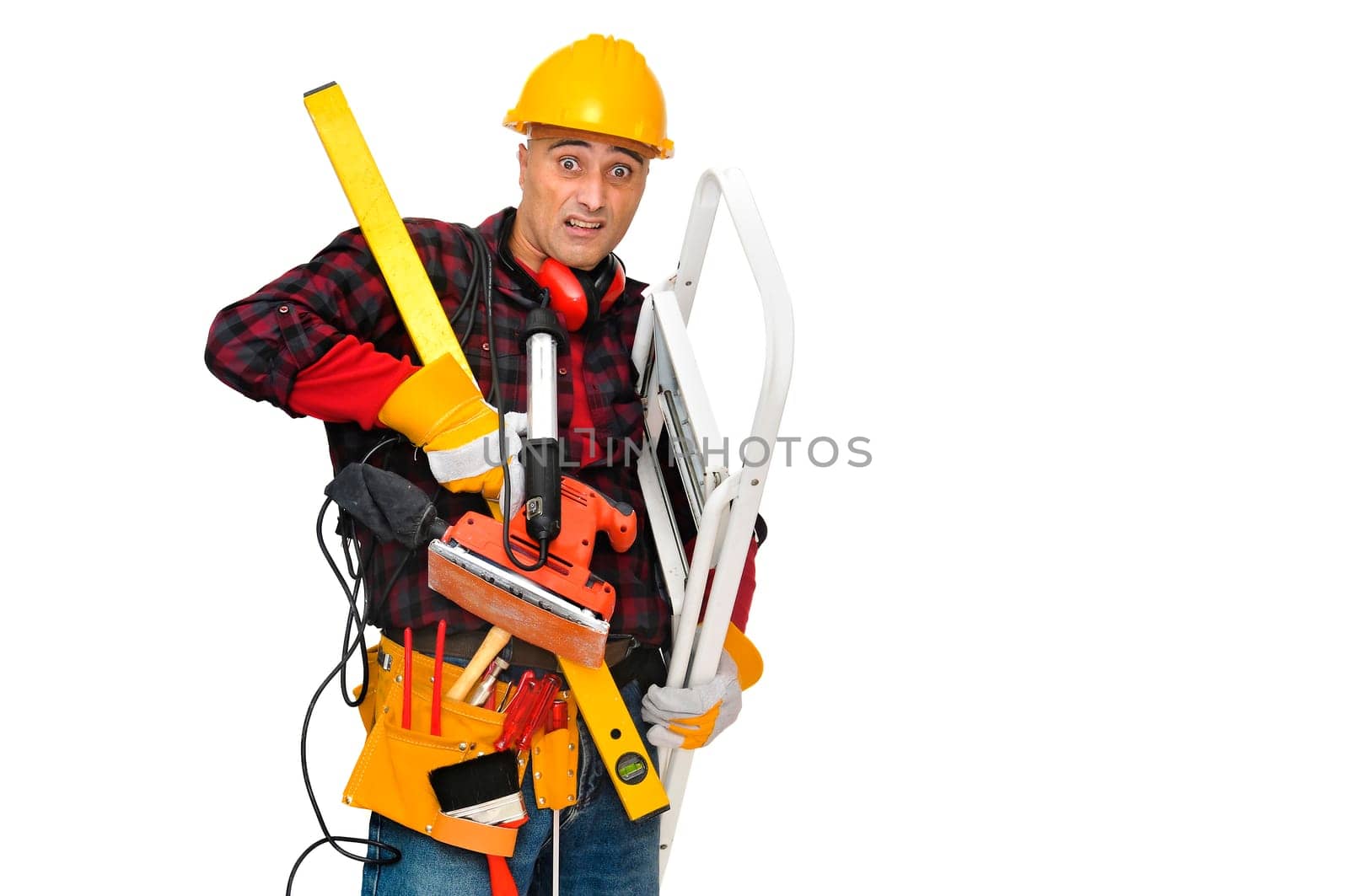 Stressed construction worker with lots of tools isolated in white