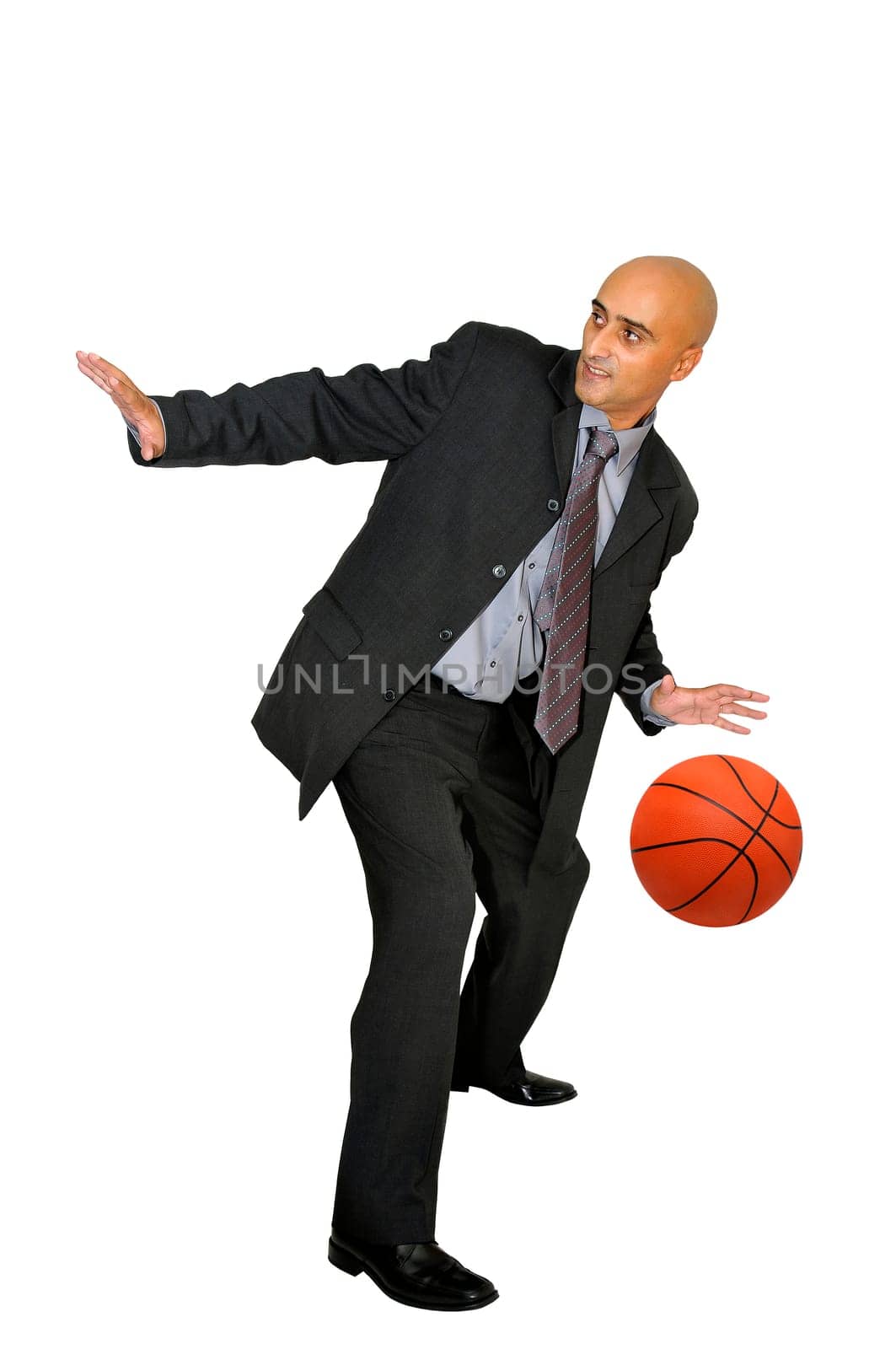 Businessman with basketball isolated in white