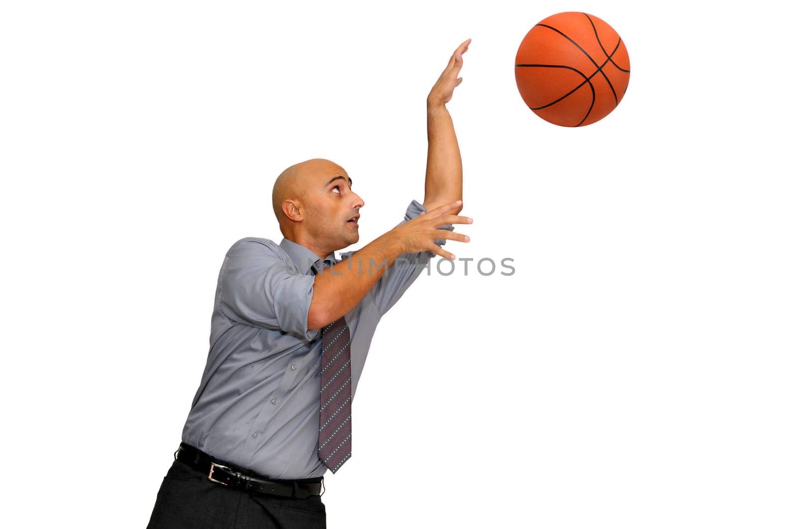 Businessman with basketball isolated in white
