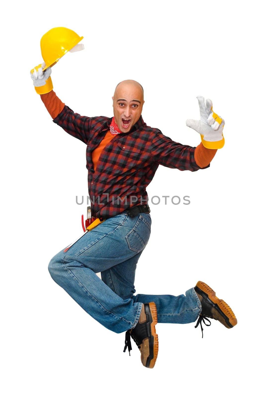 Happy construction worker jumping isolated in white