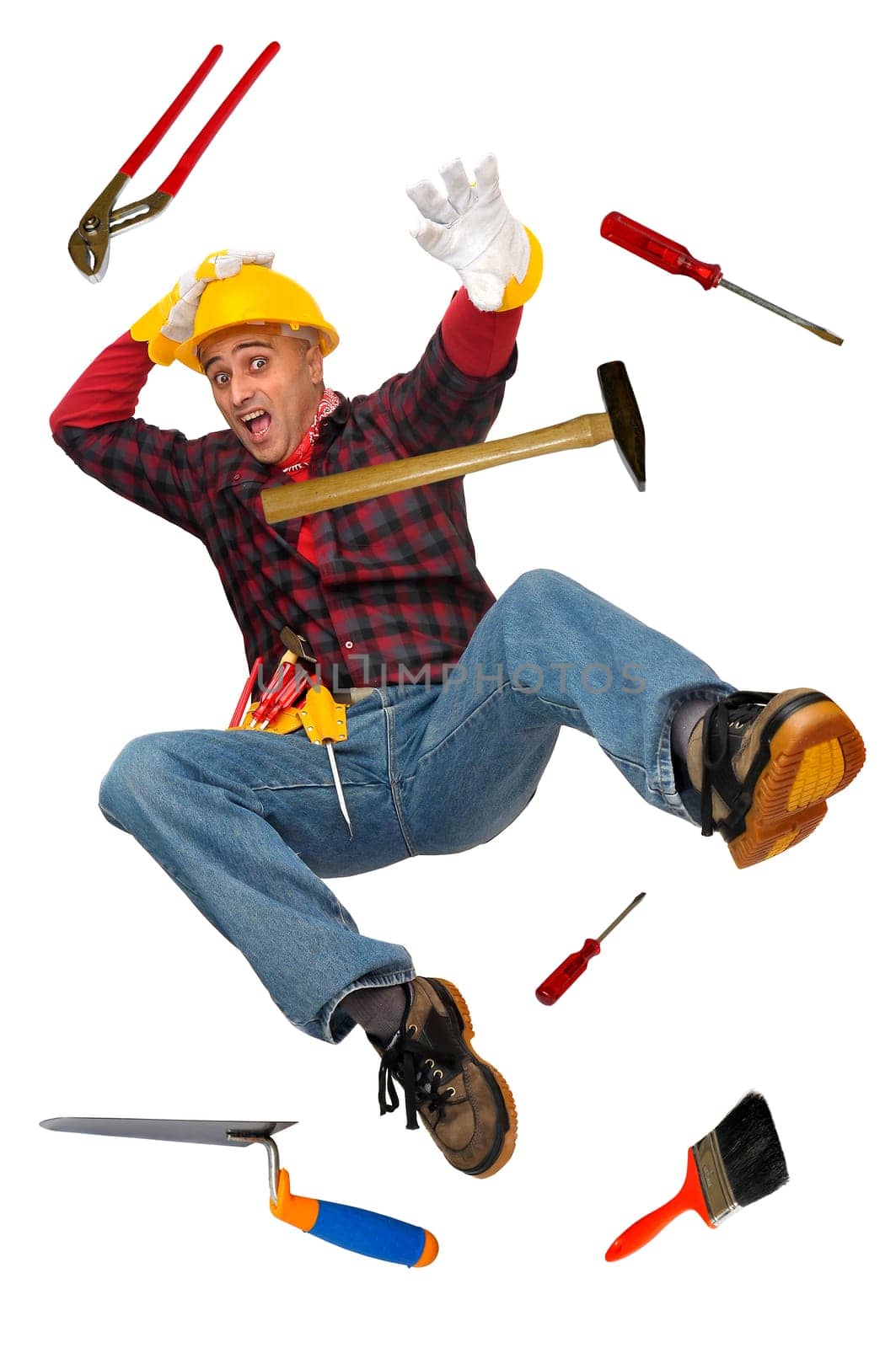 Construction worker falling with tools isolated in white